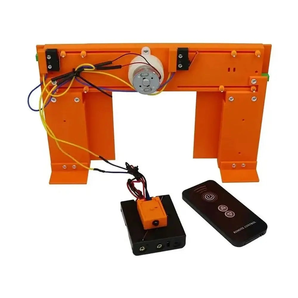 Kids DIY electric door STEM kit shown fully assembled with the motor running.