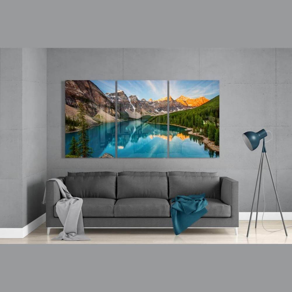 Large format tempered glass wall art featuring a serene lake and mountain view in a modern living room setting.