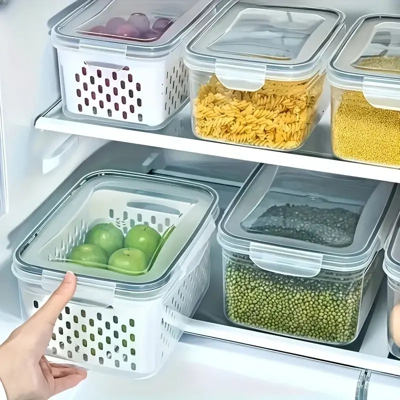 Leak-Proof Food Storage Containers, 4- or 6-Piece Sets storing fresh apples and pasta in the fridge.