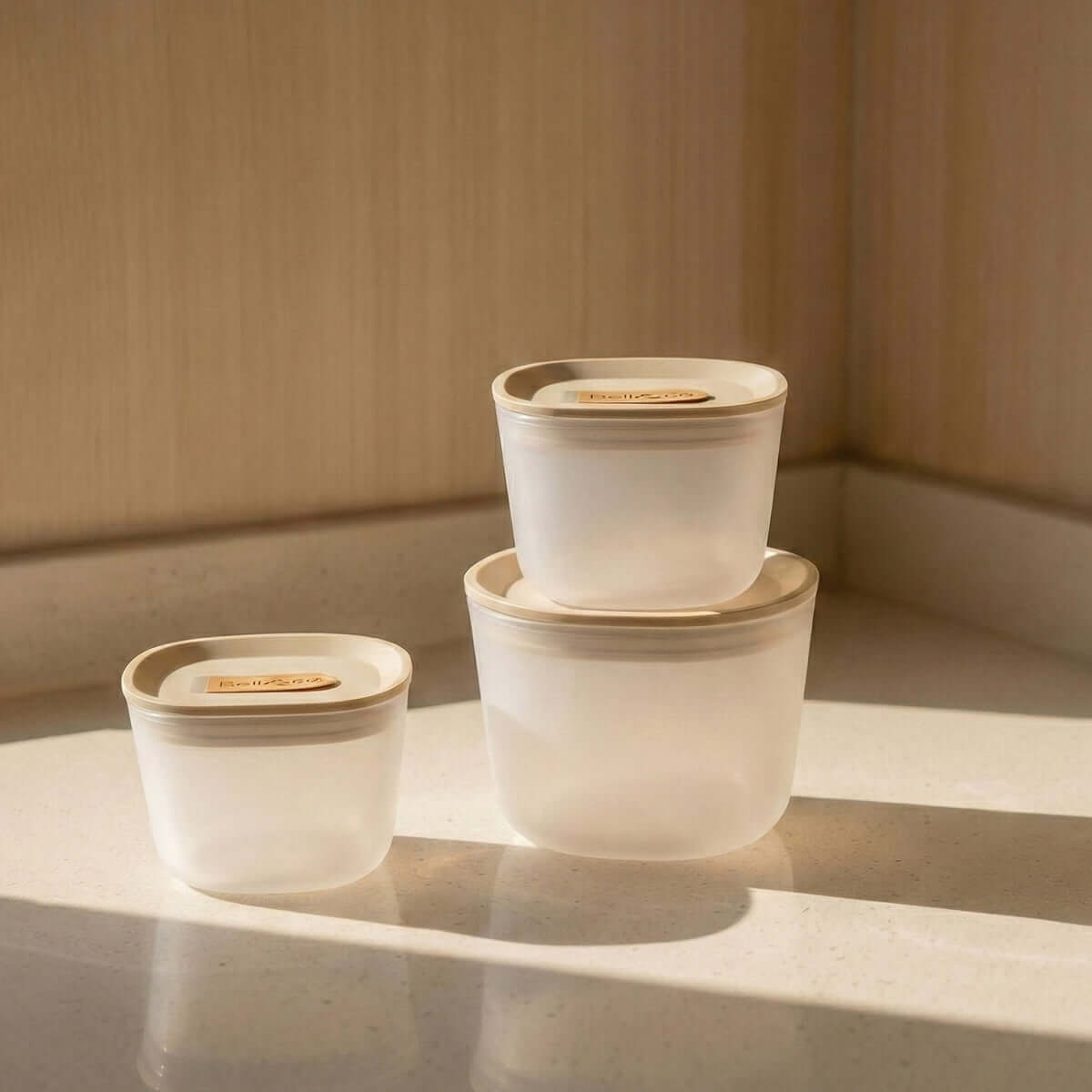 Set of glass meal prep containers with airtight silicone vent lids.