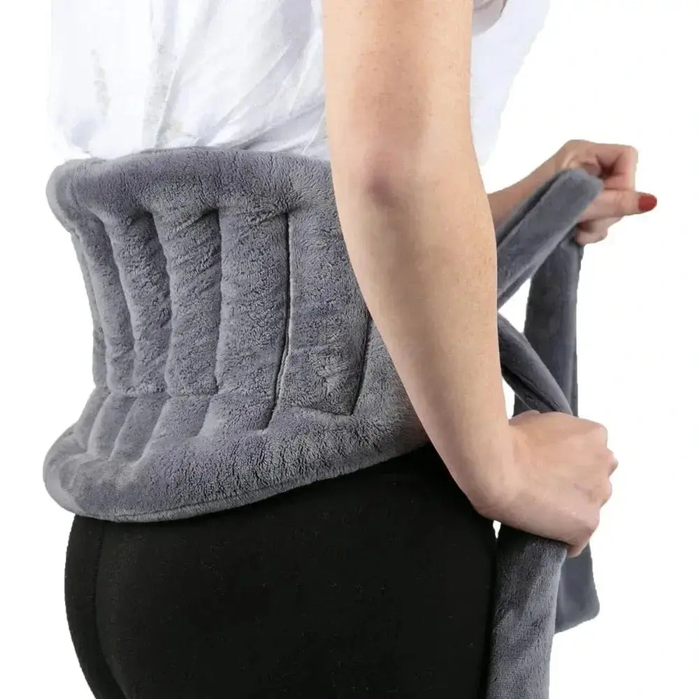 Woman adjusting a microwave heating pad wrap made of soft fleece for neck and back relief.