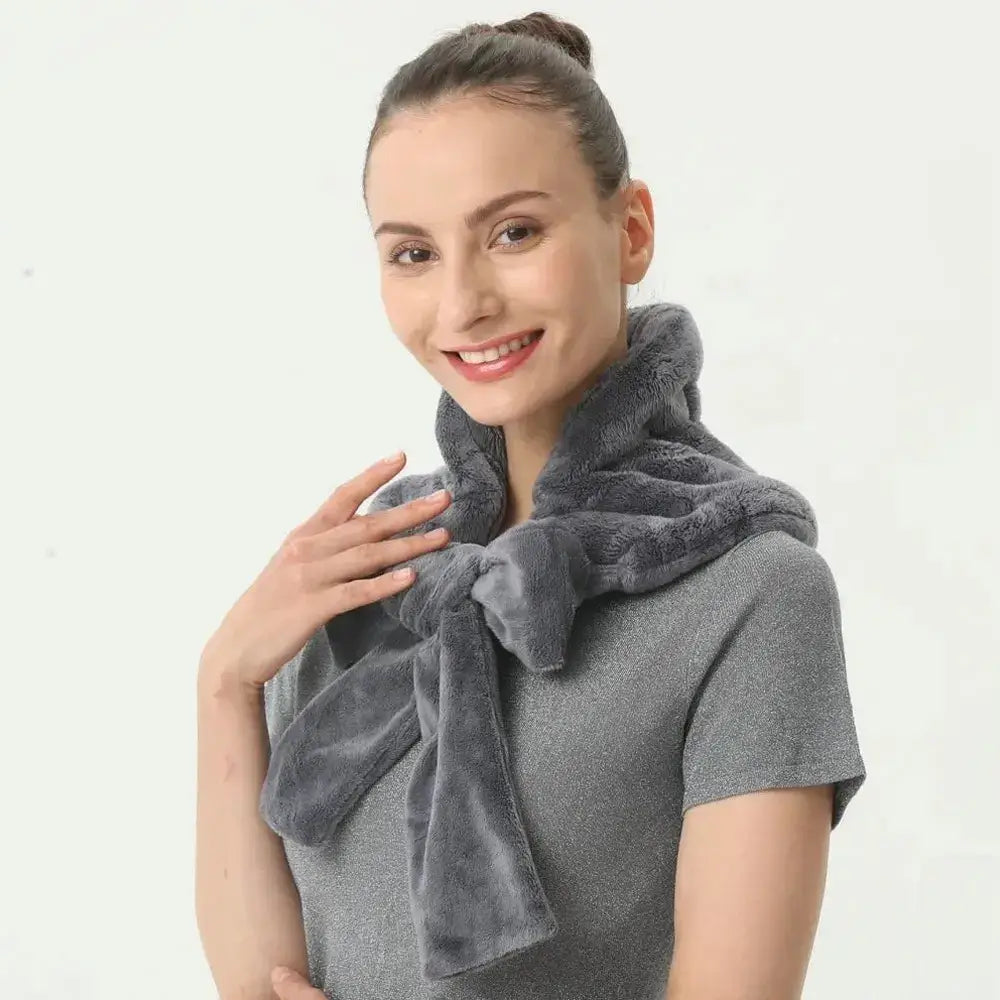 Warm and cozy microwave heating pad wrap in grey, perfect for soothing neck and shoulder relaxation.