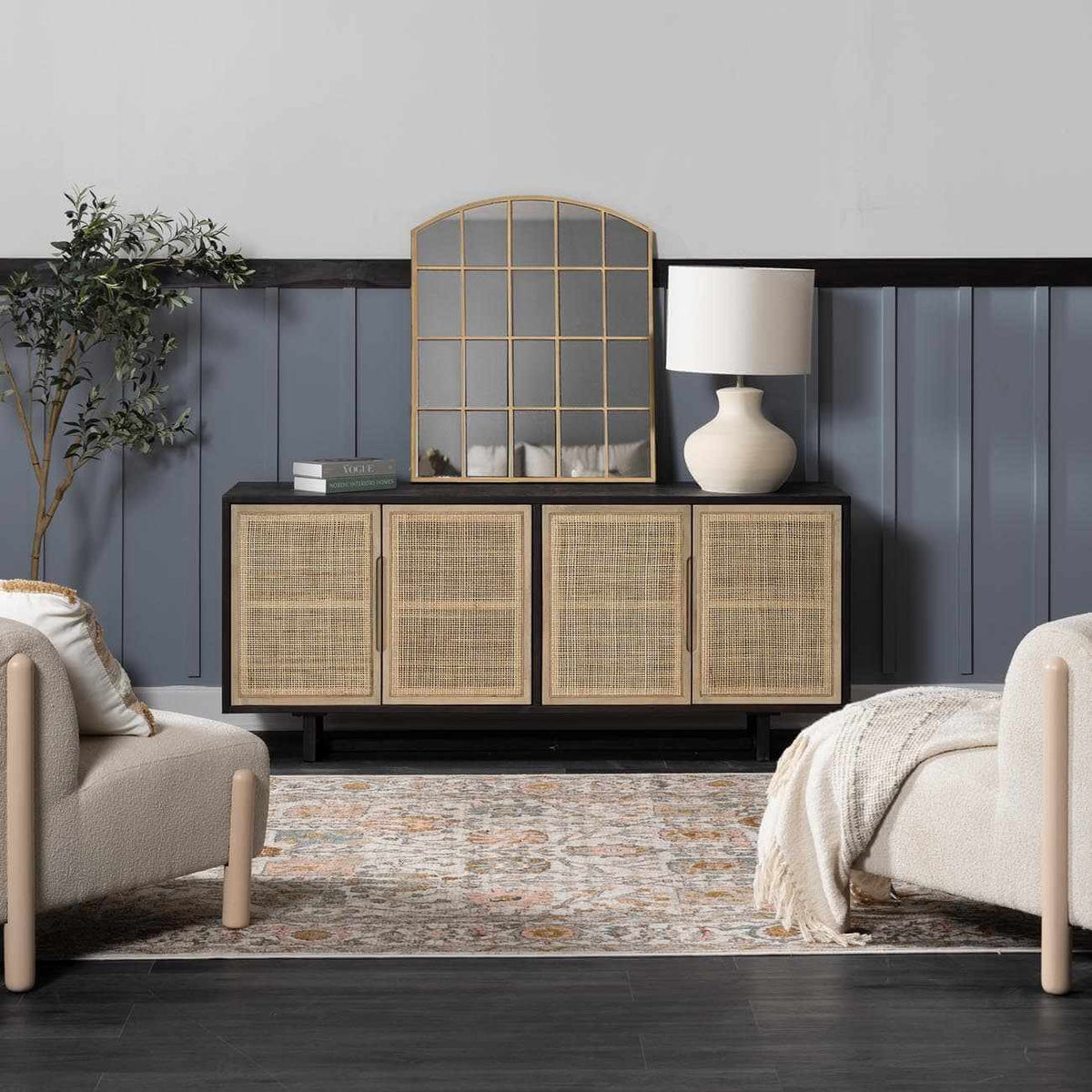 Elegant area rug under a stylish cabinet and a modern lamp in a contemporary living room setting.