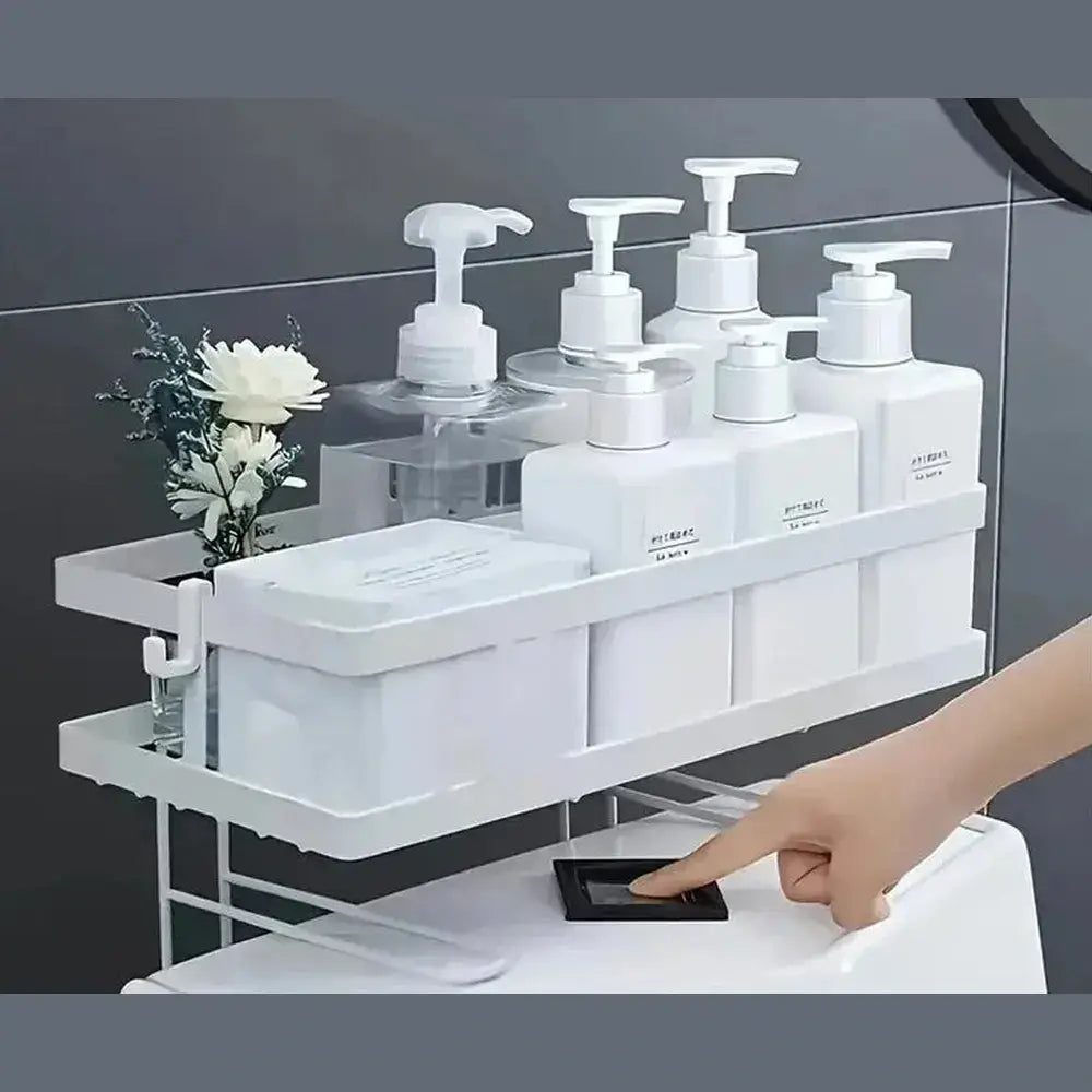 Organized view of over-the-toilet storage shelf, featuring bathroom toiletries and decor, optimizing space above the toilet.