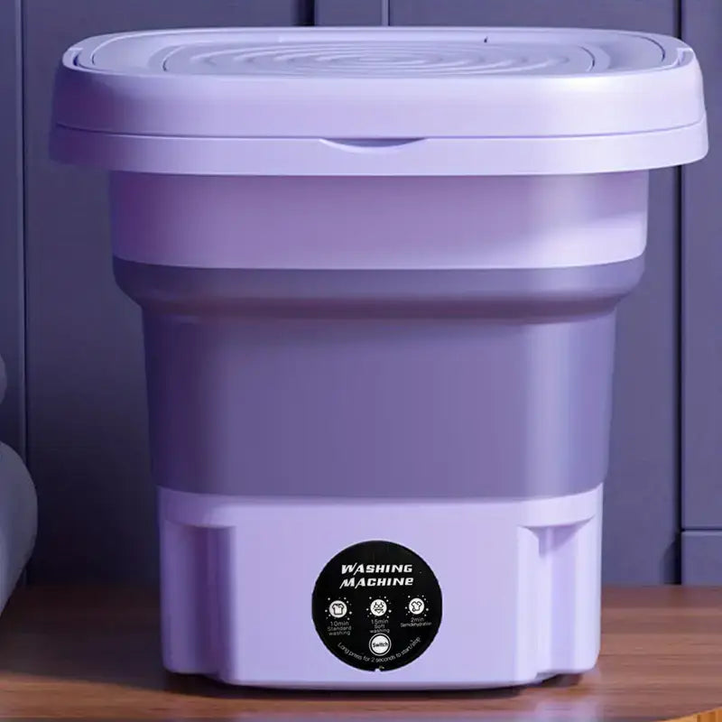 Compact portable mini washing machine for apartments, dorms, and travel.