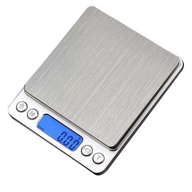 Precision digital kitchen scale with 0.1g readability and a tare function.