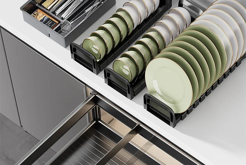 Pull-Out Cabinet Organizer with Sliding Baskets, 600–800 mm with neatly arranged dishes and utensils.