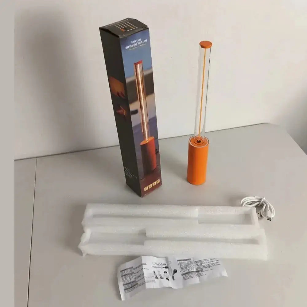 Rechargeable LED night light geometric bar with USB and packaging, showcasing warm glow feature.
