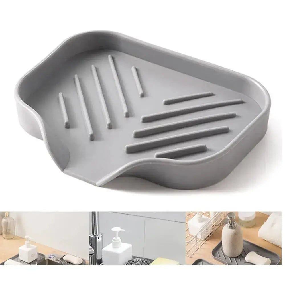 Silicone auto-draining sponge holder for organized sink area, promoting airflow and quick drying.