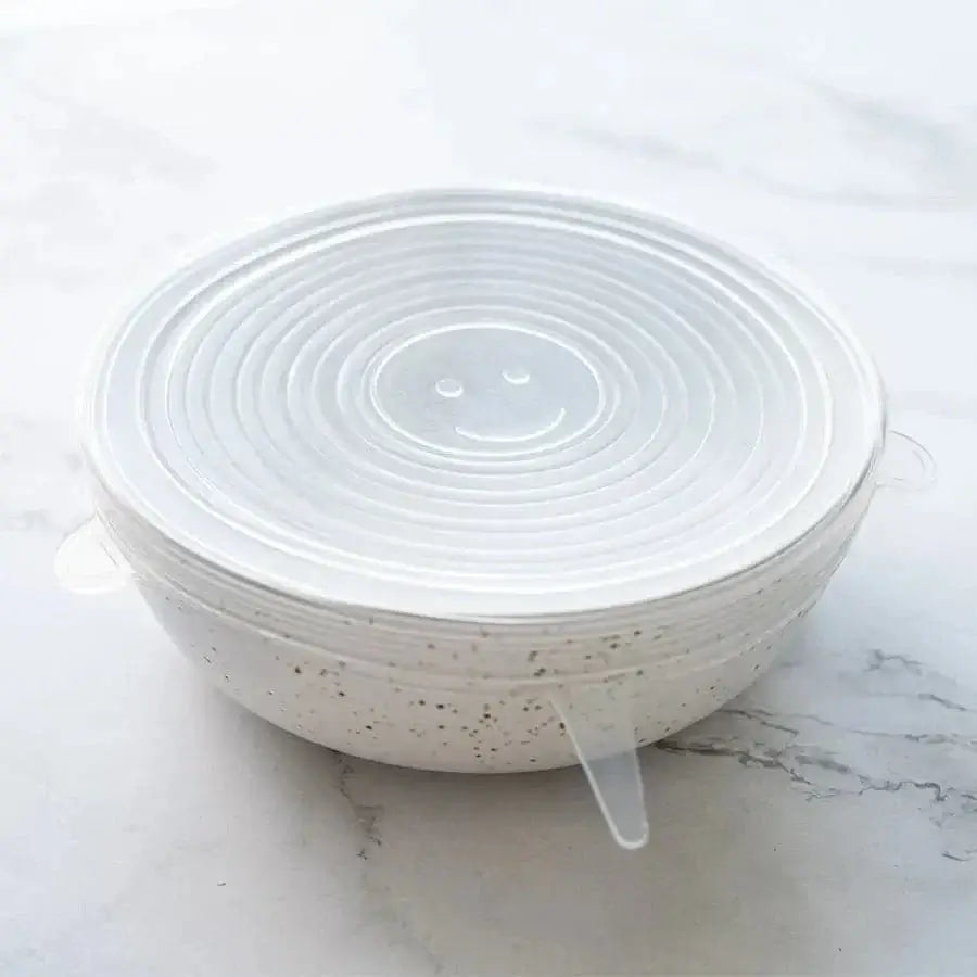 Stack of reusable silicone bowl covers showing their flexible, stretchable material.