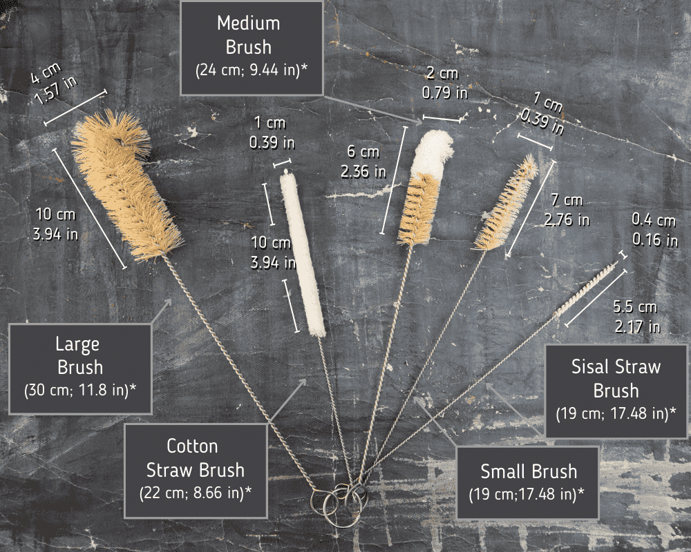 Sisal bottle brush being used to scrub the inside of a glass bottle.