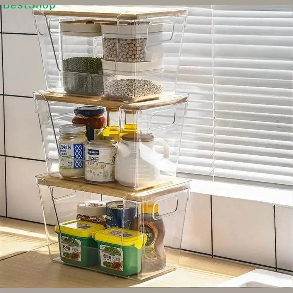 Clear pantry organizer bins with bamboo lid stacked for easy visibility and access to pantry items.