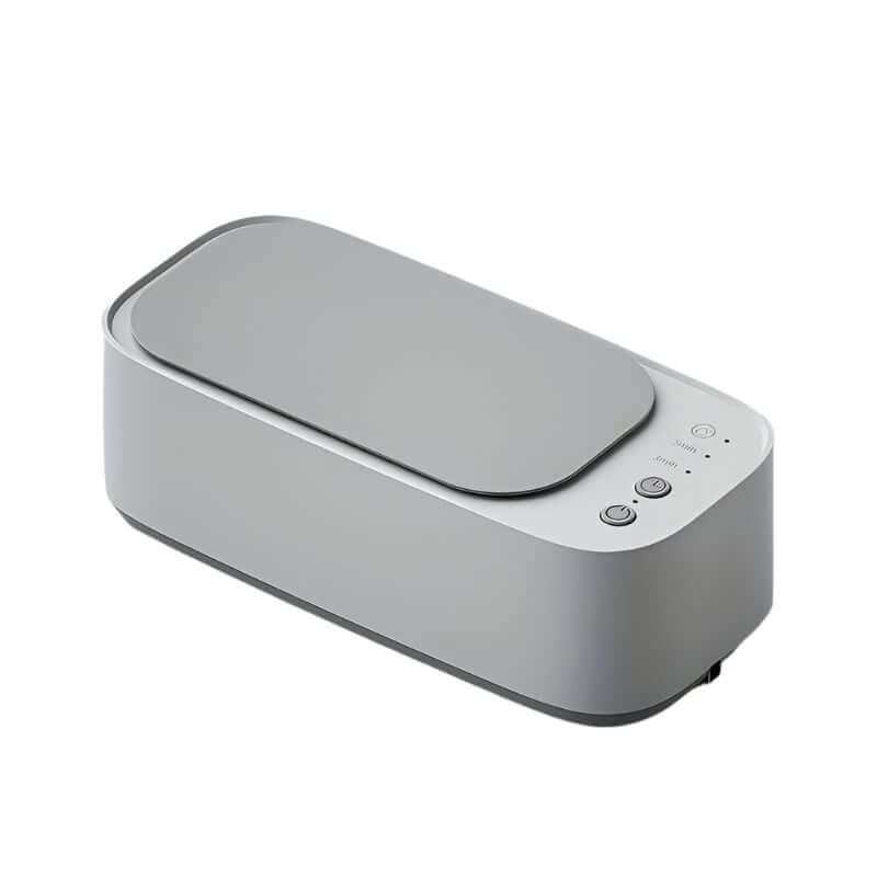 Compact ultrasonic jewelry cleaner for jewelry, glasses, and watches.