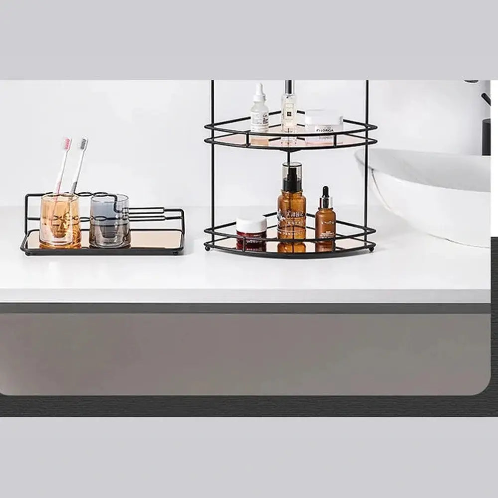 Black wall-mounted bathroom corner shelf with toiletries and beauty products on a white countertop.
