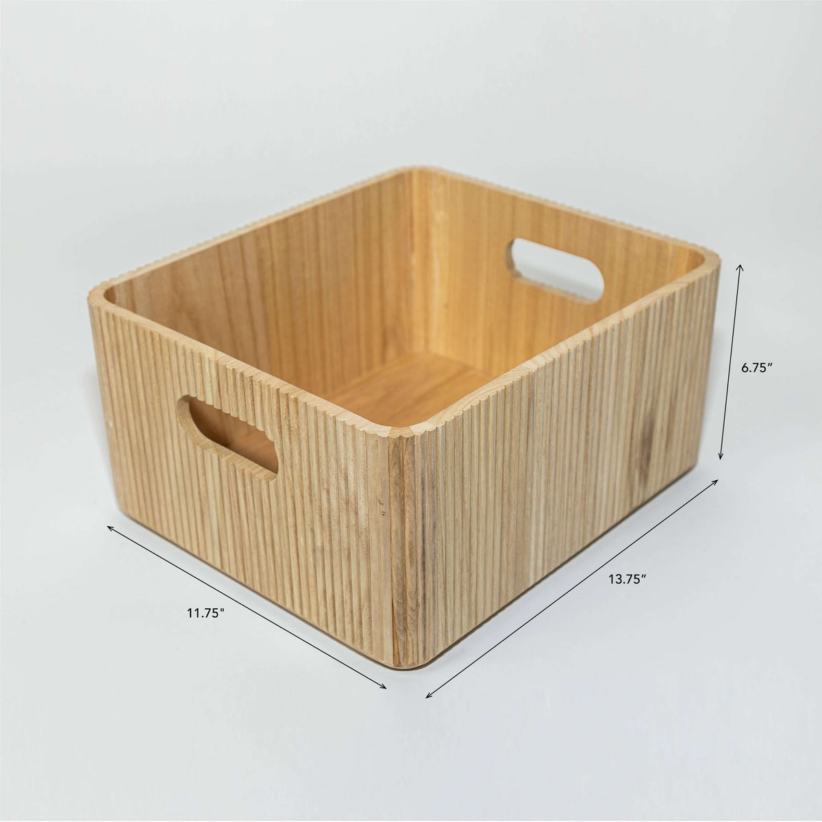 wooden ribbed storage bin in natural paulownia wood with handles and fluted exterior design