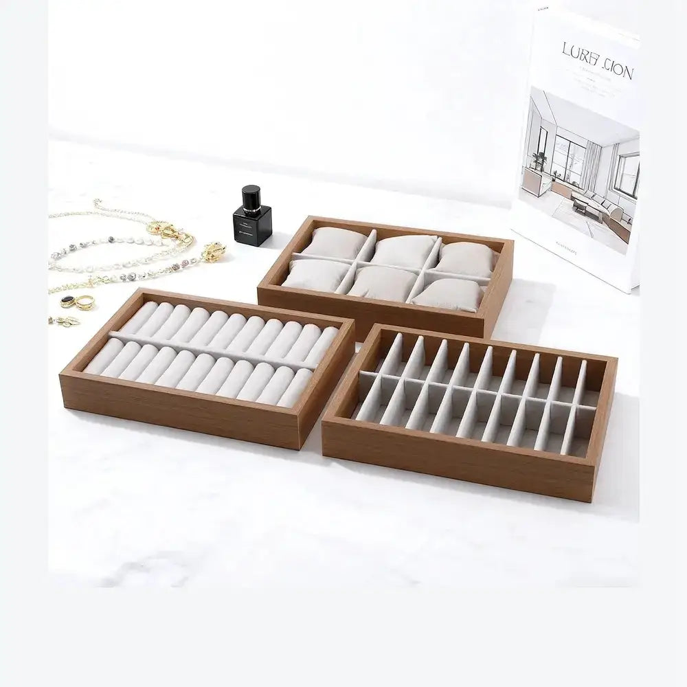 Wooden velvet jewelry tray organizer with three stackable sections for rings, bangles, and watches.