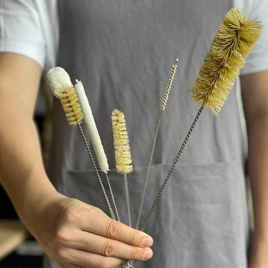 Zero waste kitchen cleaning brush set with natural bristles for eco-friendly dishwashing.